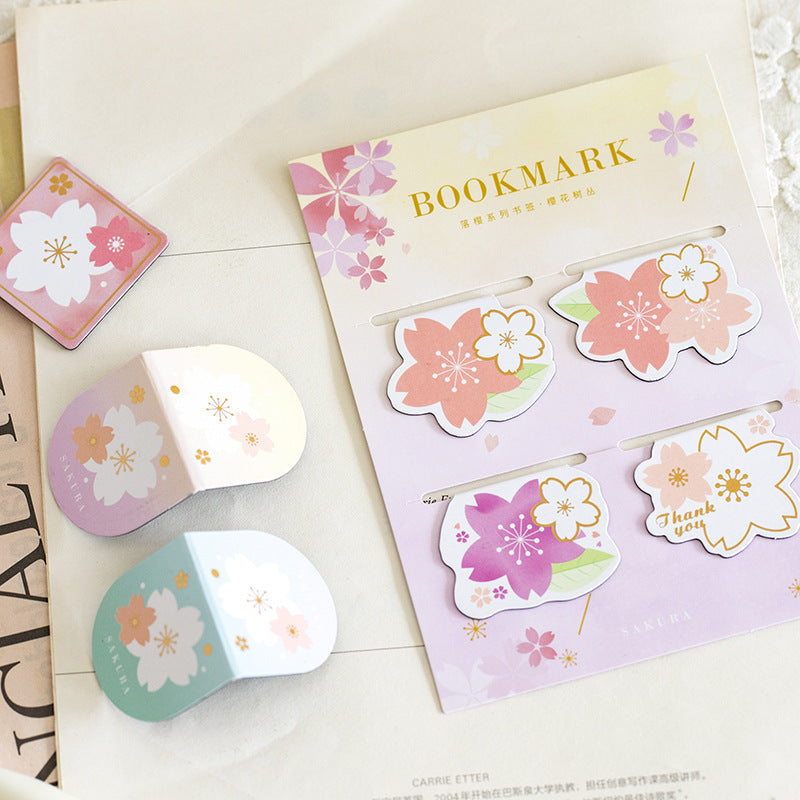 Sakura bookmark set with packaging on a light surface