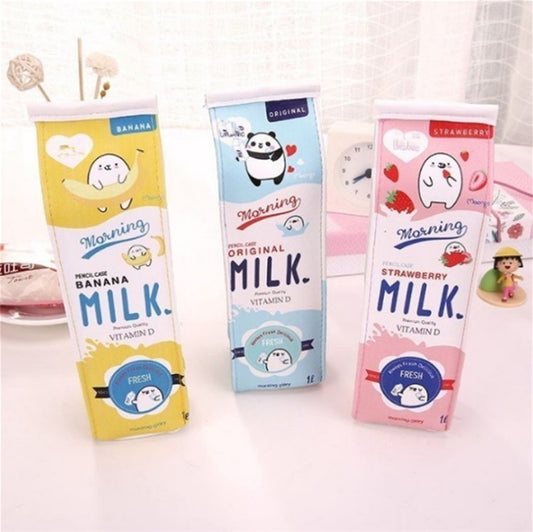 Three cartoon-themed milk carton Pencil Cases on a white background