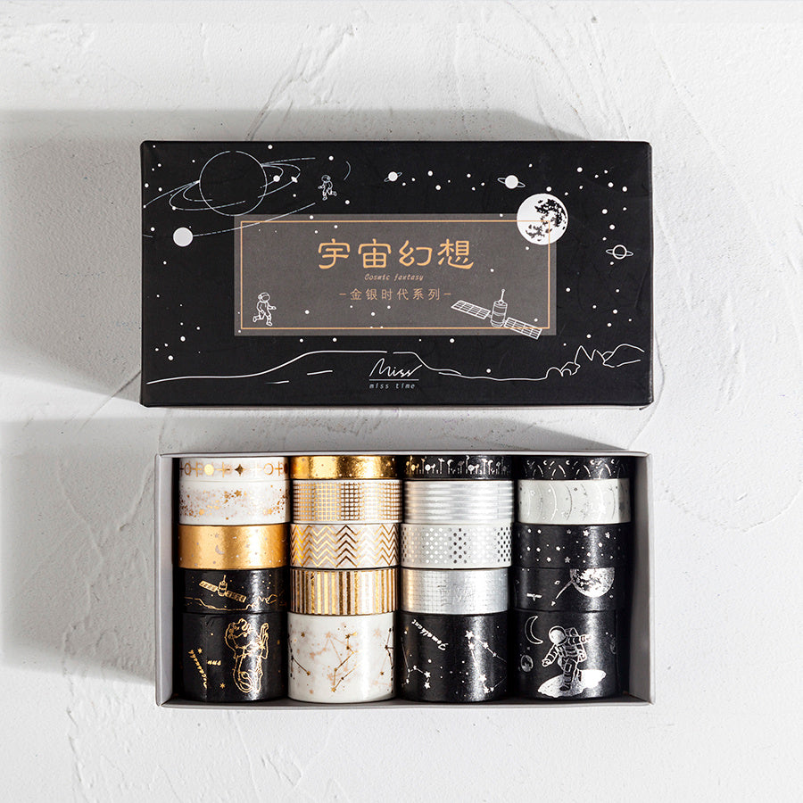 Set of washi tape rolls in a decorative box with space-themed design