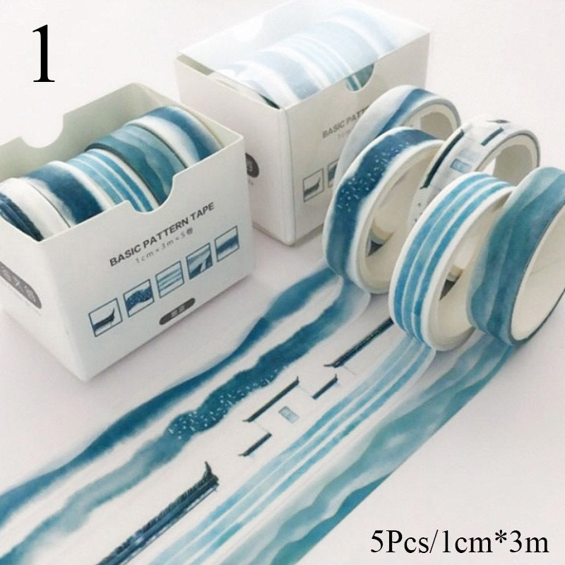 Set of blue and white patterned tapes with a box on a white background