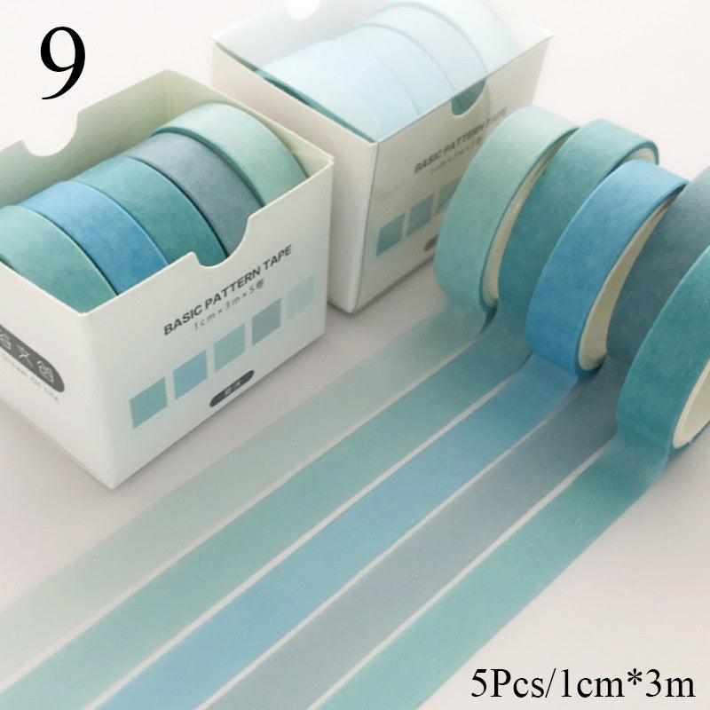 Set of blue patterned tapes with packaging on a white background