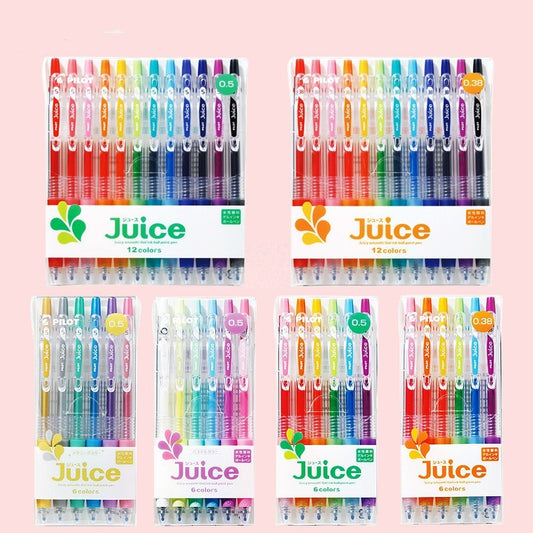Juice gel pens in various colors on a pink background