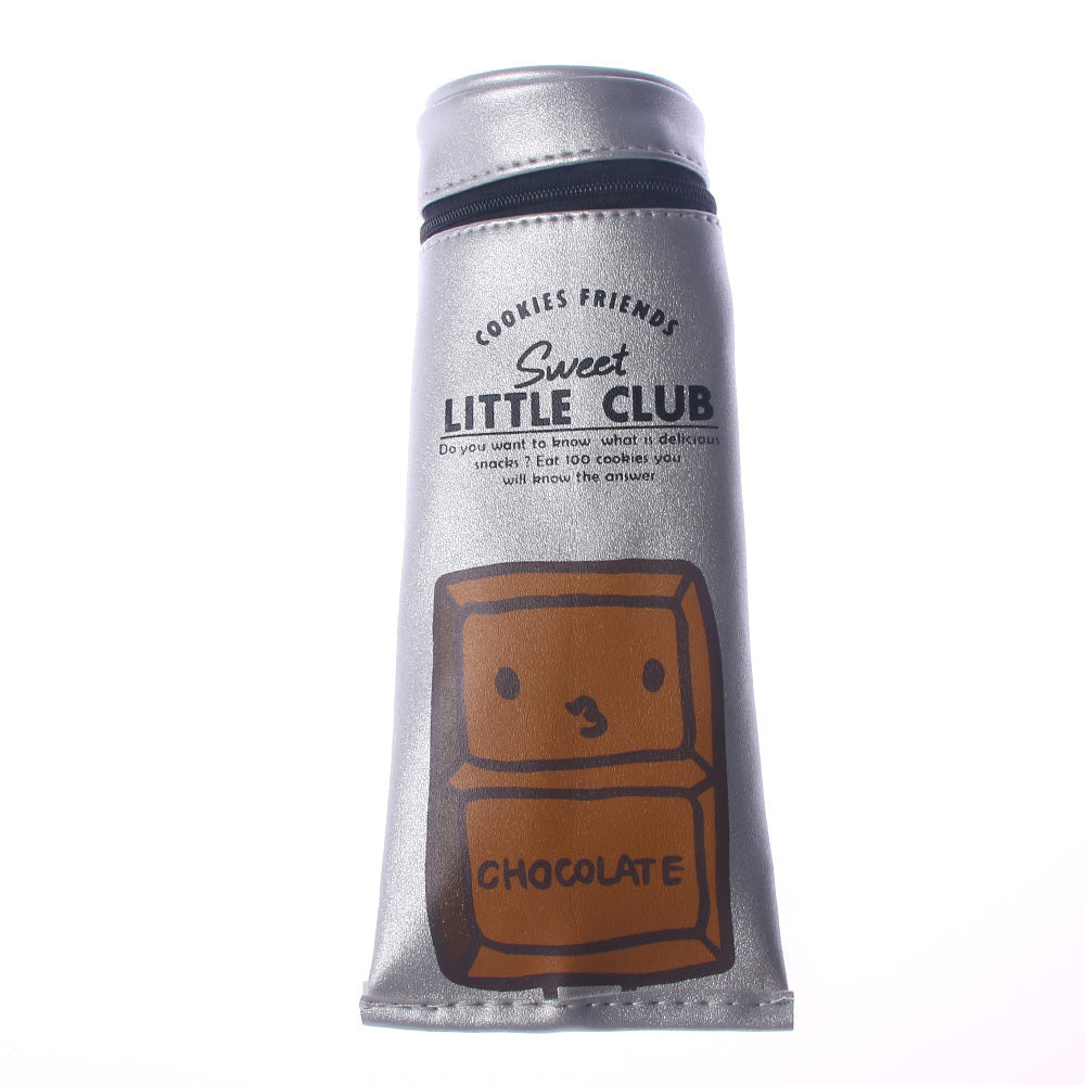 Silver packaging of 'Cookies & Friends Sweet Little Club' chocolate with cartoon cookie design on a white background
