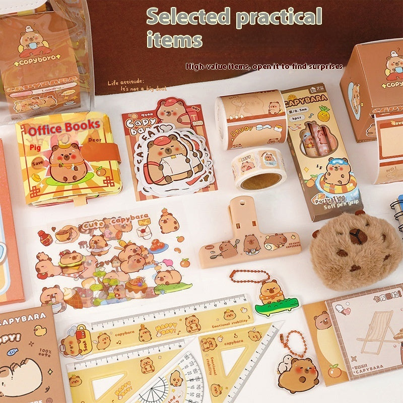 Collection of stationery items with Capybara design on a white background