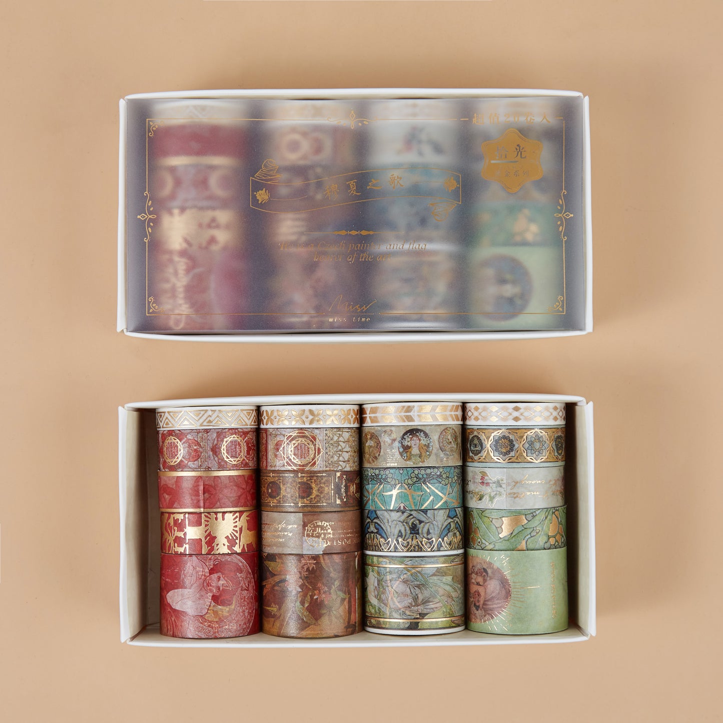Set of washi tape rolls in a decorative box on a beige background