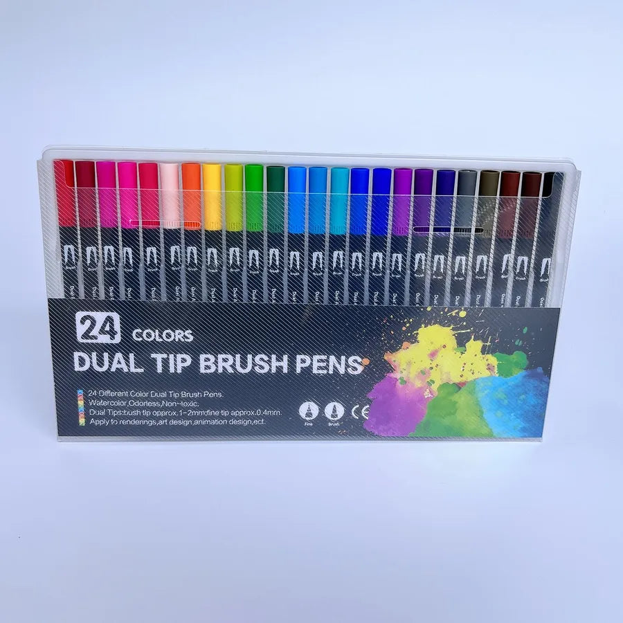 "24 color dual tip brush pens in clear storage case with rainbow arrangement and modern black packaging"