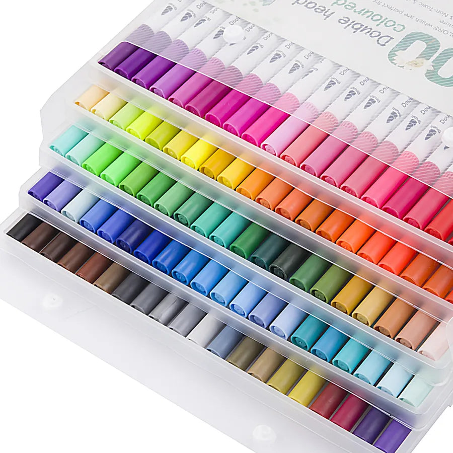 "Kawaii dual tip watercolor brush pens organized in rainbow gradient storage case showing full color spectrum"